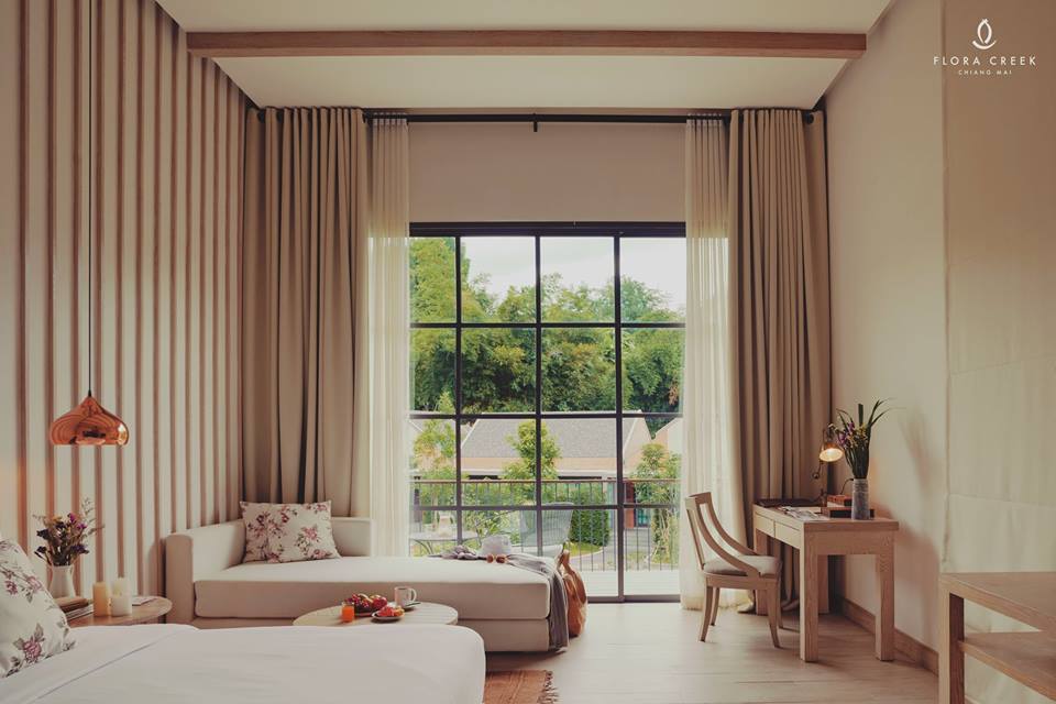 Bright guest room with a garden view at Flora Creek Chiang Mai